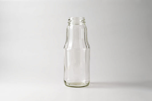 Glass juice bottle 1.0 L. Lids included.