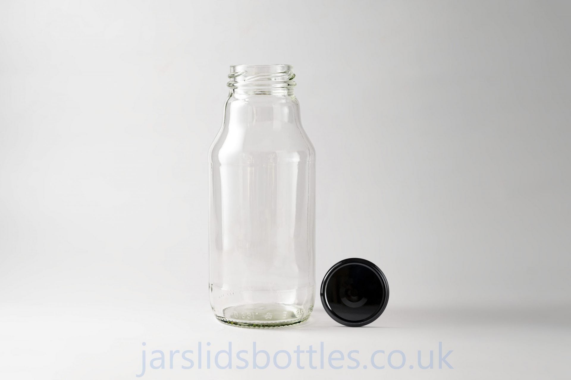 Glass bottle 330 ml Soczek. Lids included.