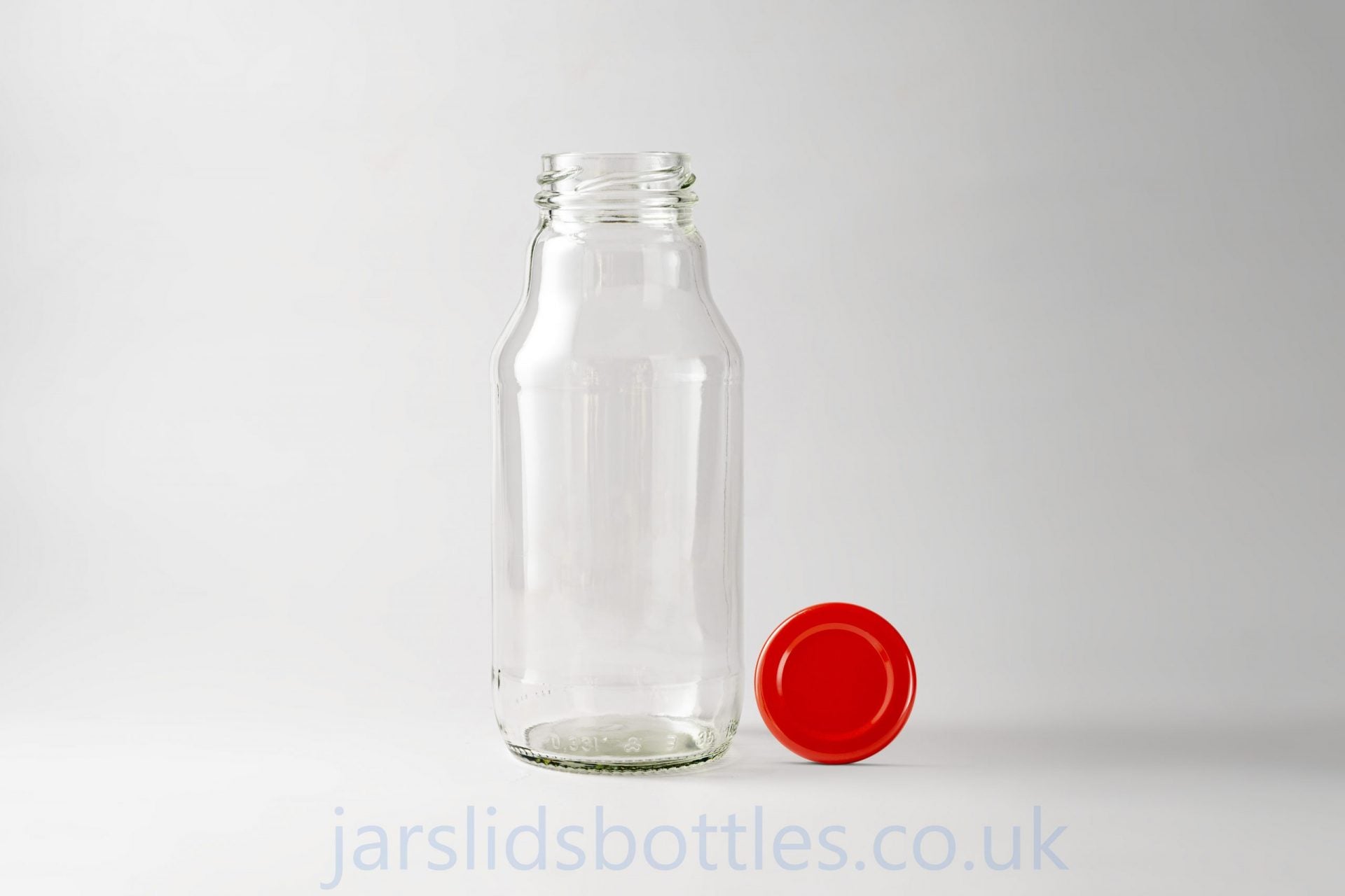 Glass bottle 330 ml Soczek. Lids included.