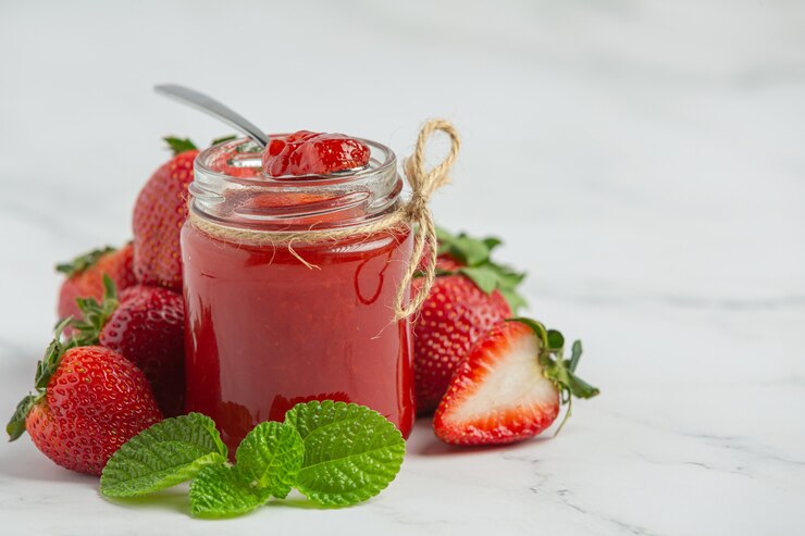 strawberry jam in glass jar