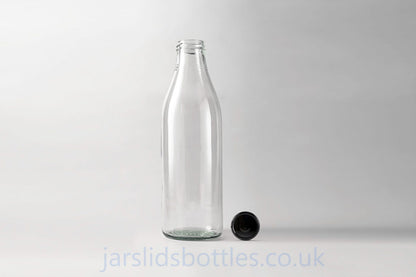 Glass milk bottle 1.0 L. Lids included.