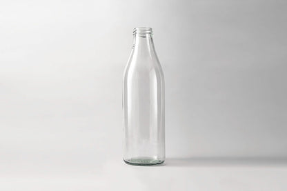 Glass milk bottle 1.0 L. Lids included.