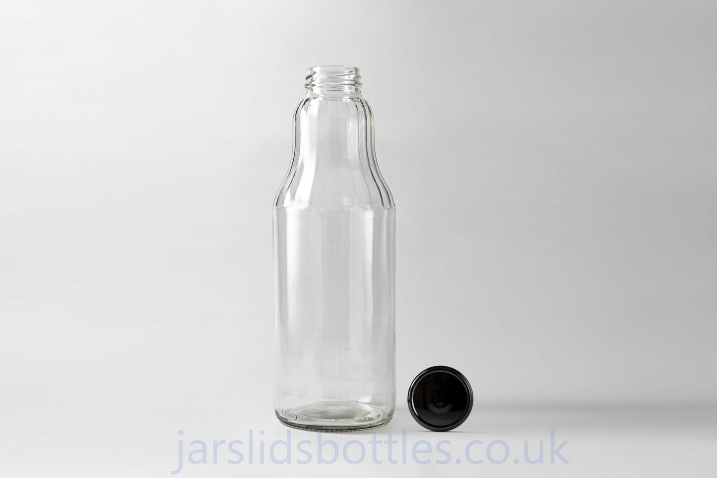 Glass juice bottle 1.0 L Fruit. Lids included.