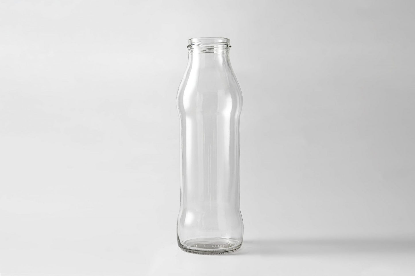 Glass juice bottle 720 ml. Lids included.