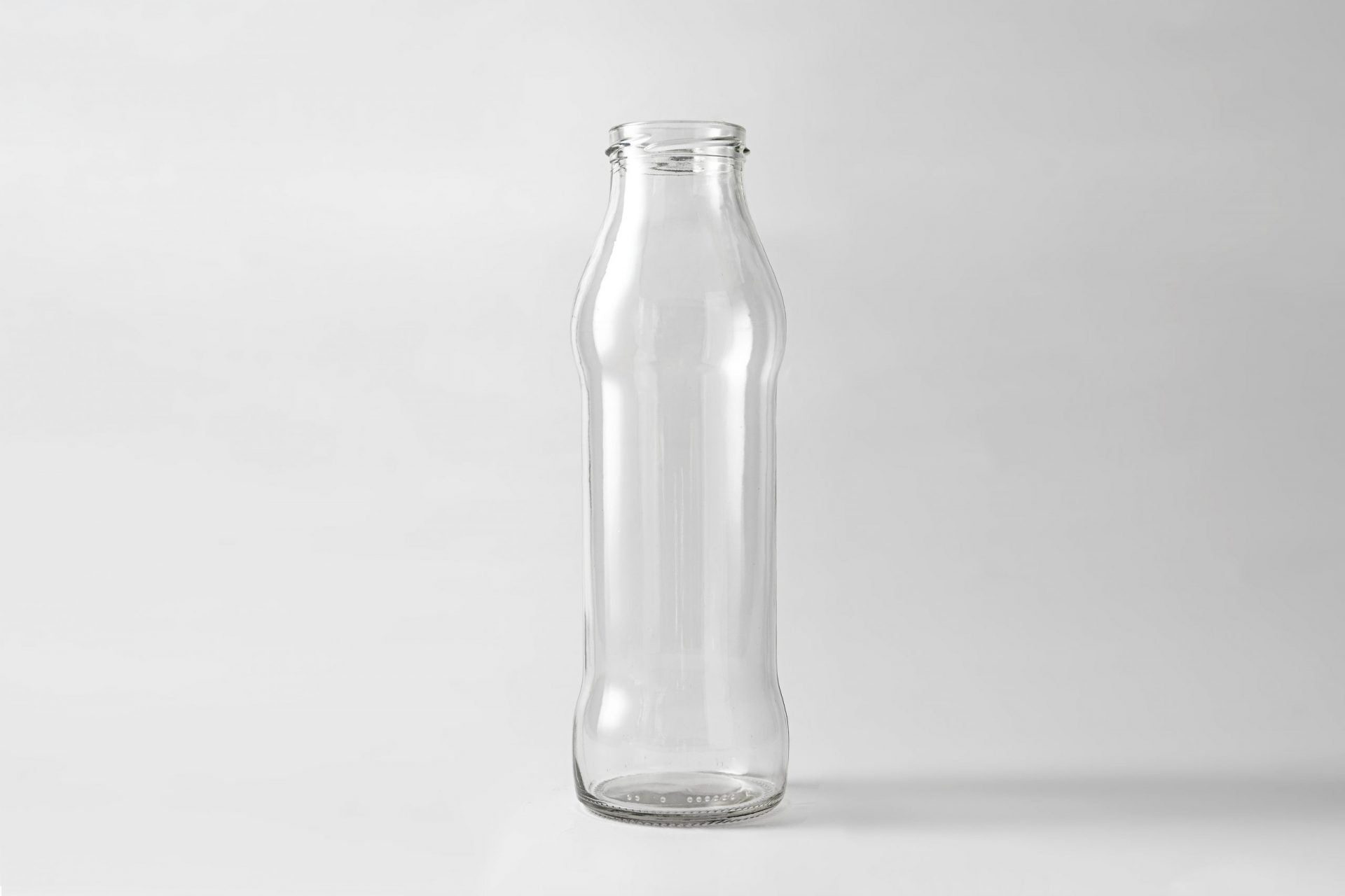 Glass juice bottle 720 ml. Lids included.