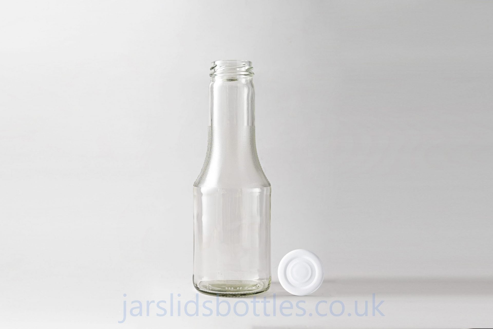 Glass juice bottle 500 ml Lunt. Lids included.