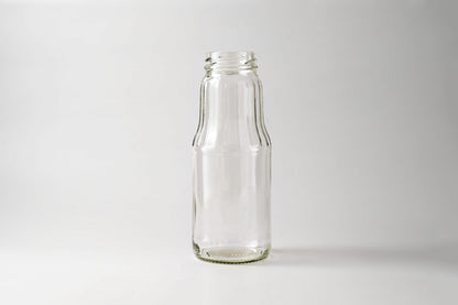 Glass juice bottle 1.0 L. Lids included.