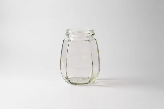 Glass jar 385 ml Peach. Lids included.