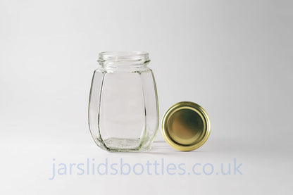 Glass jar 385 ml Peach. Lids included.