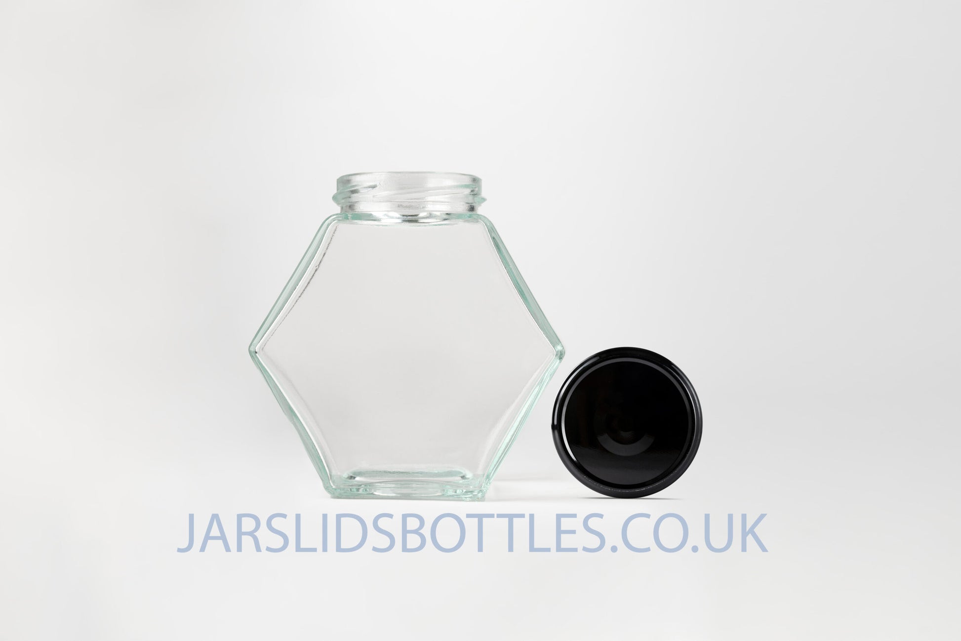 Glass Hexagon Jar 280ml Honey black lids