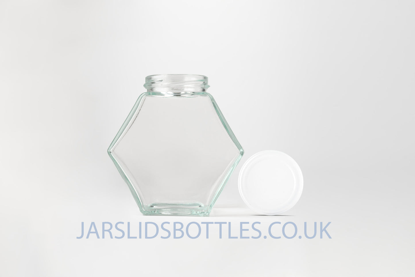 Glass Hexagon Jar 280ml Honey white lids