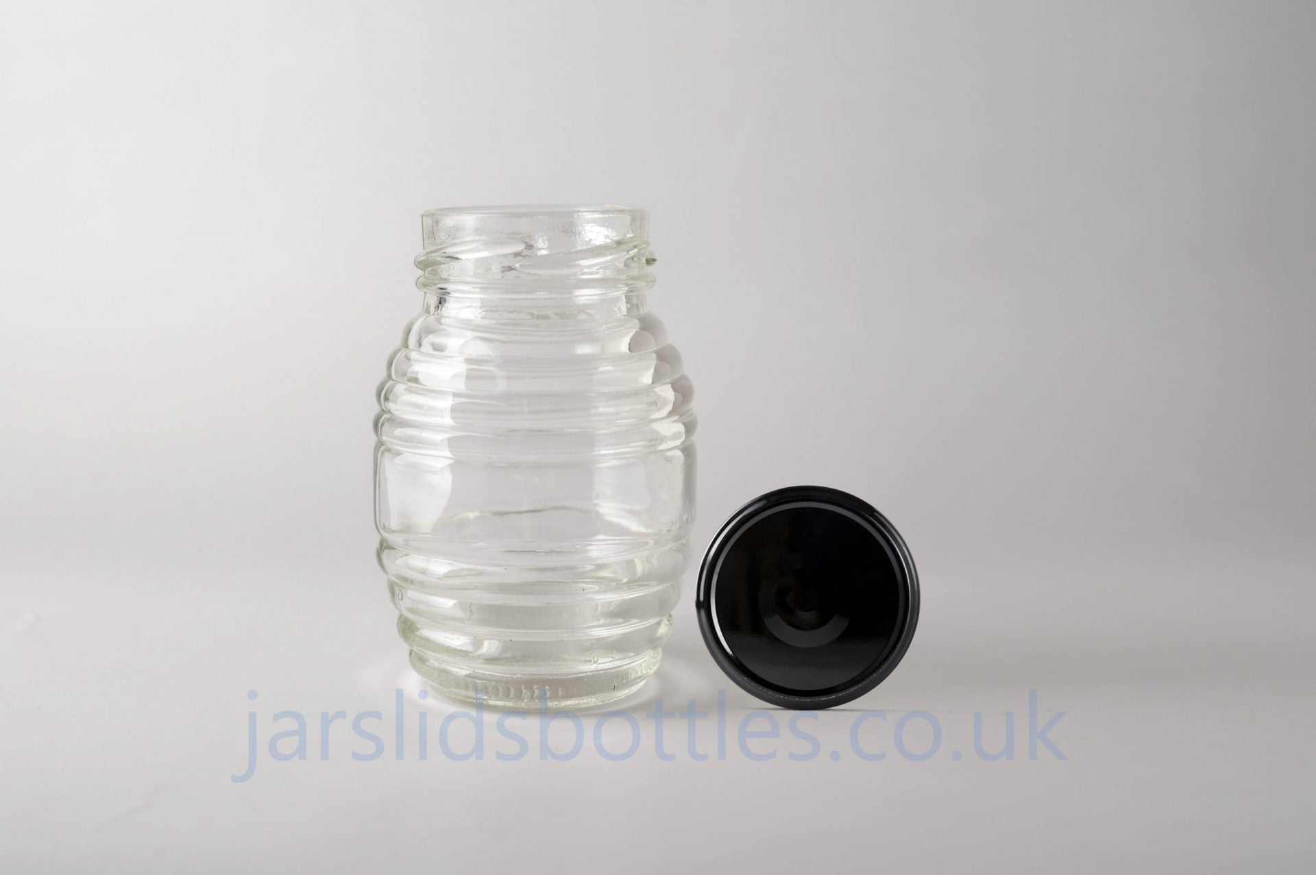 Glass Jar 105ml Honey black lid